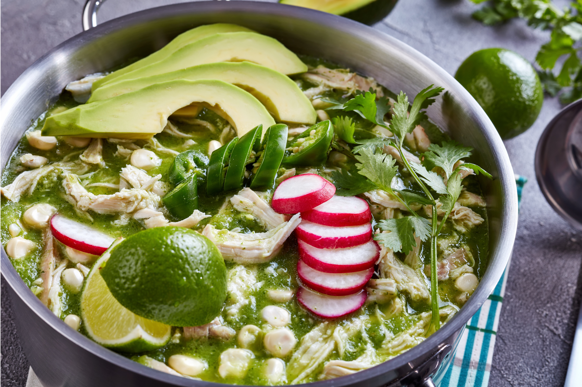 a bowl of soup made with salsa verde chicken